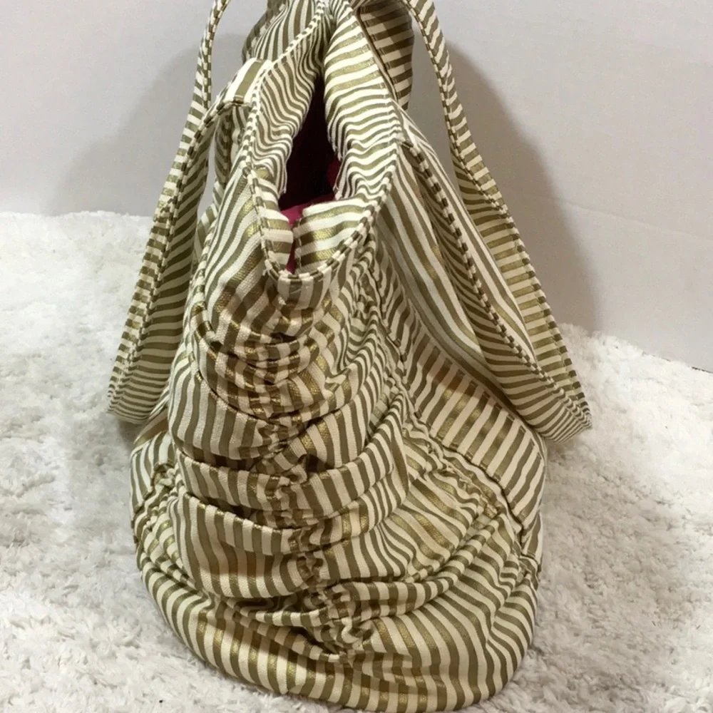 Bella Tunno gold/cream tote/diaper bag